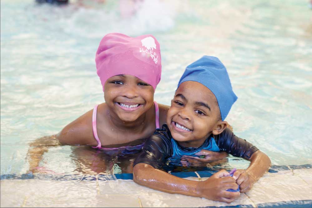 two girls swimming