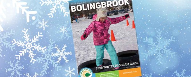 Small girl playing in snow