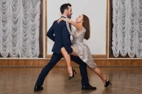 Adult Caucasian couple dancing ballroom dance